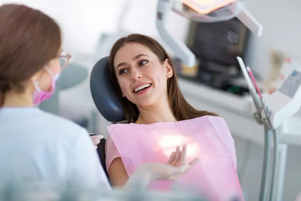 Patient receiving root canal treatment in a modern dental suite